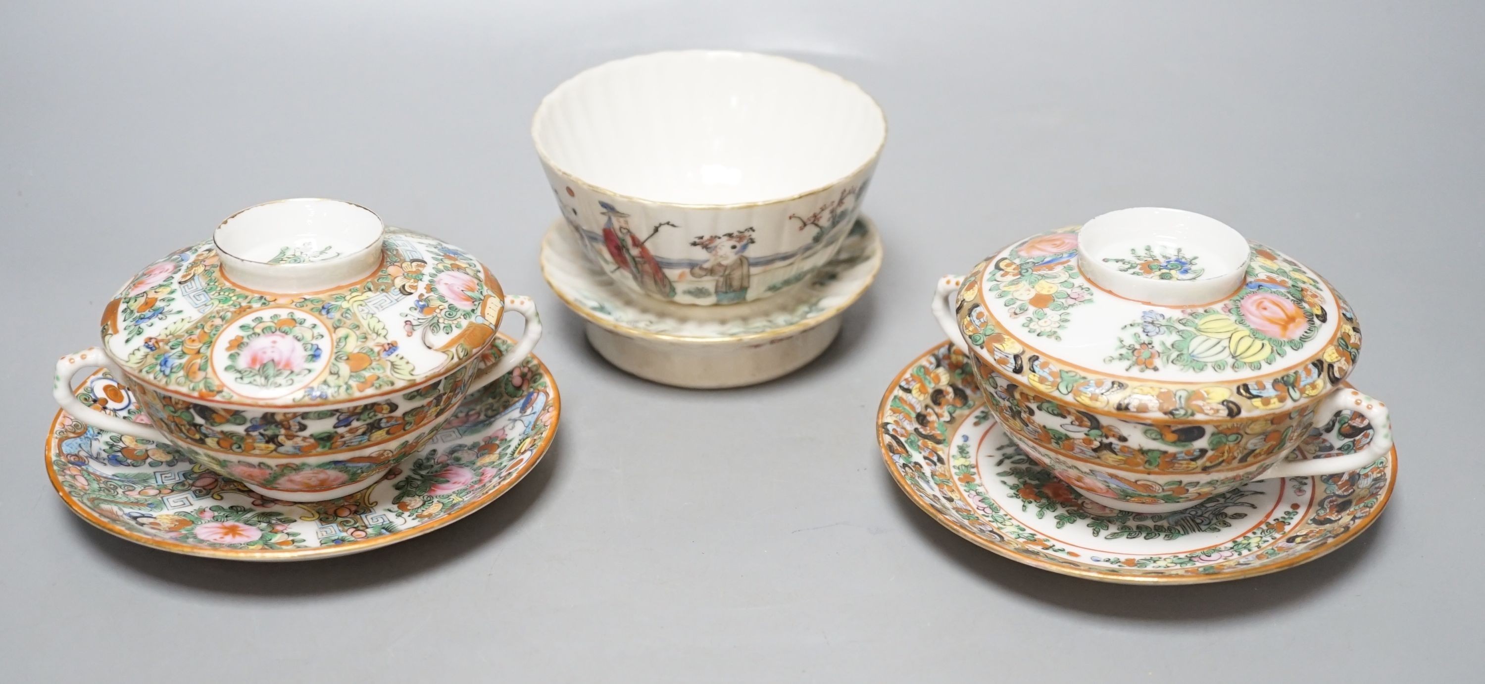 A Chinese porcelain tea bowl and stand and a pair of Cantonese bowls, covers and stands, 14cm diameter